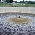 Water holding pond for compost