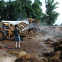 Turning and wetting compost